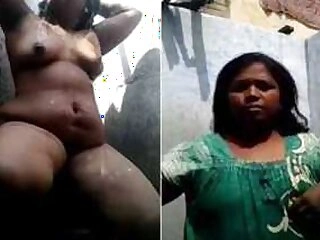 Desi seductress films XXX showering on