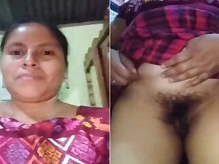 Middle aged Indian model unsheathes her