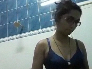 Indian nurse strips nude and pleasures