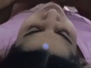 A duo unclothing and getting intimate in