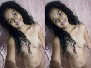 A gorgeous chick flaunts her bare bod in