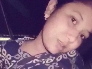 Bangladeshi woman in the bare takes a