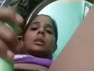 Indian lady uses vegetable as  toy in